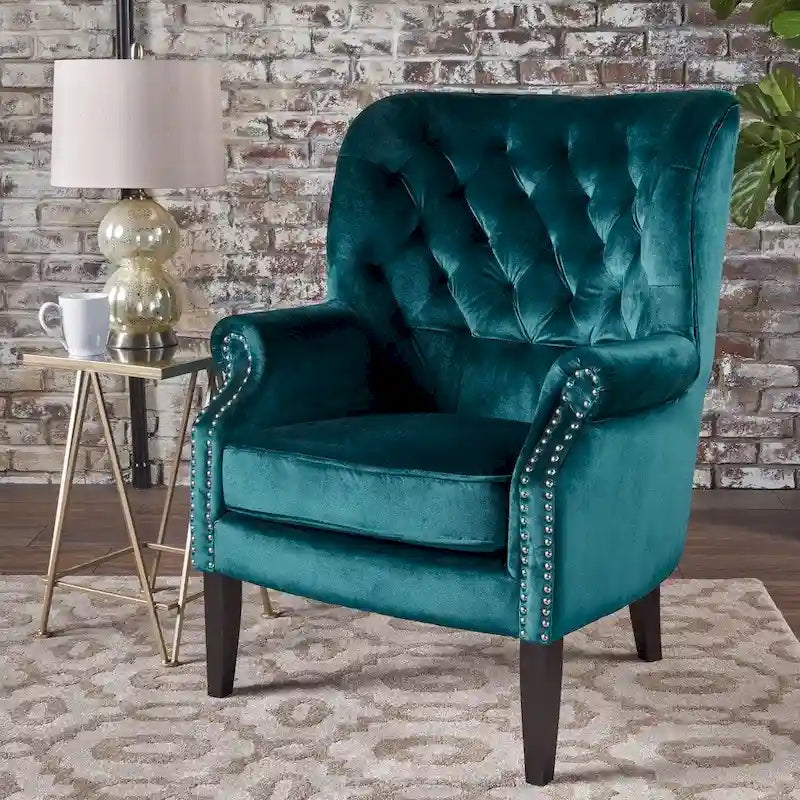 Fauteuil club en velours clouté