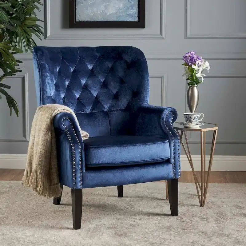 Fauteuil club en velours clouté