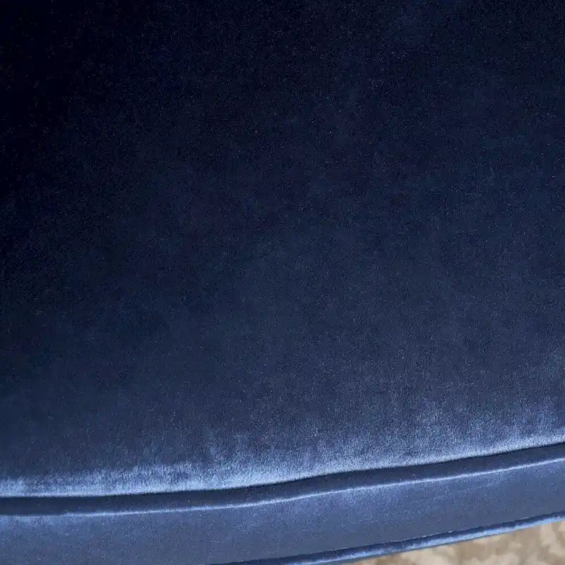 Fauteuil club en velours clouté
