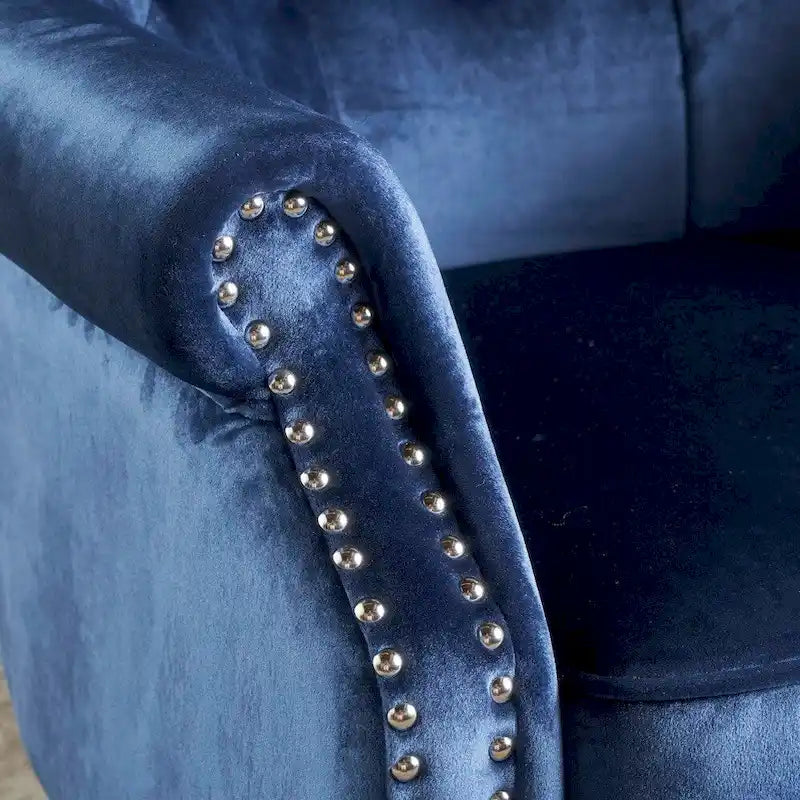 Fauteuil club en velours clouté