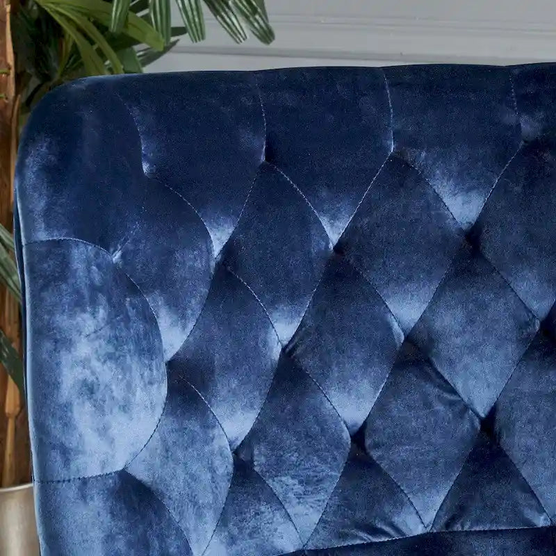 Fauteuil club en velours clouté