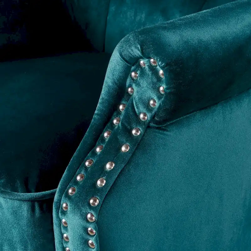 Fauteuil club en velours clouté