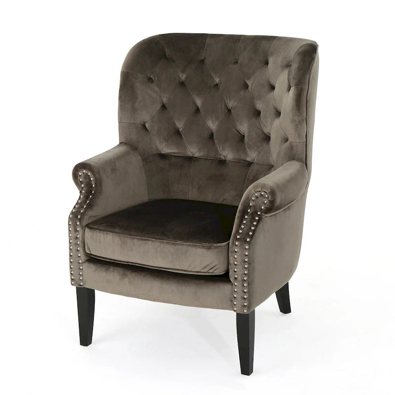 Fauteuil club en velours clouté
