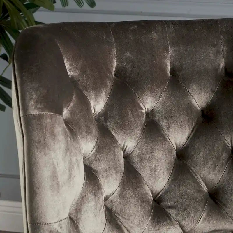Fauteuil club en velours clouté