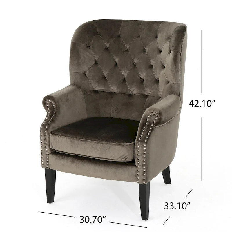 Fauteuil club en velours clouté