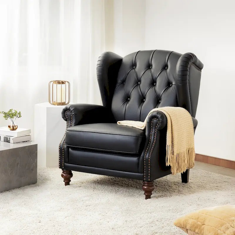 Fauteuil club en cuir clouté