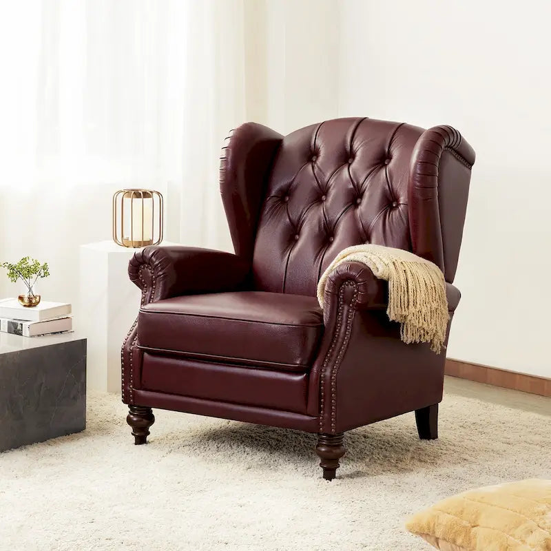 Fauteuil club en cuir clouté