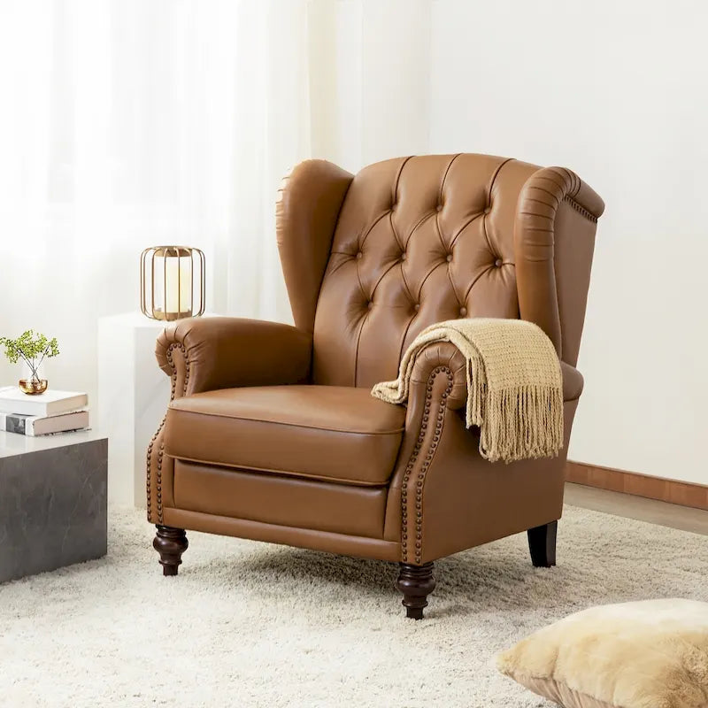 Fauteuil club en cuir clouté