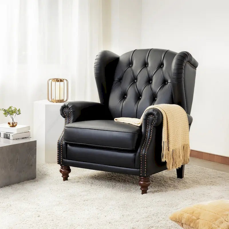Fauteuil club en cuir clouté