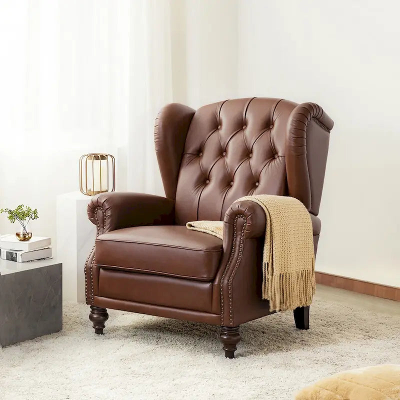 Fauteuil club en cuir clouté