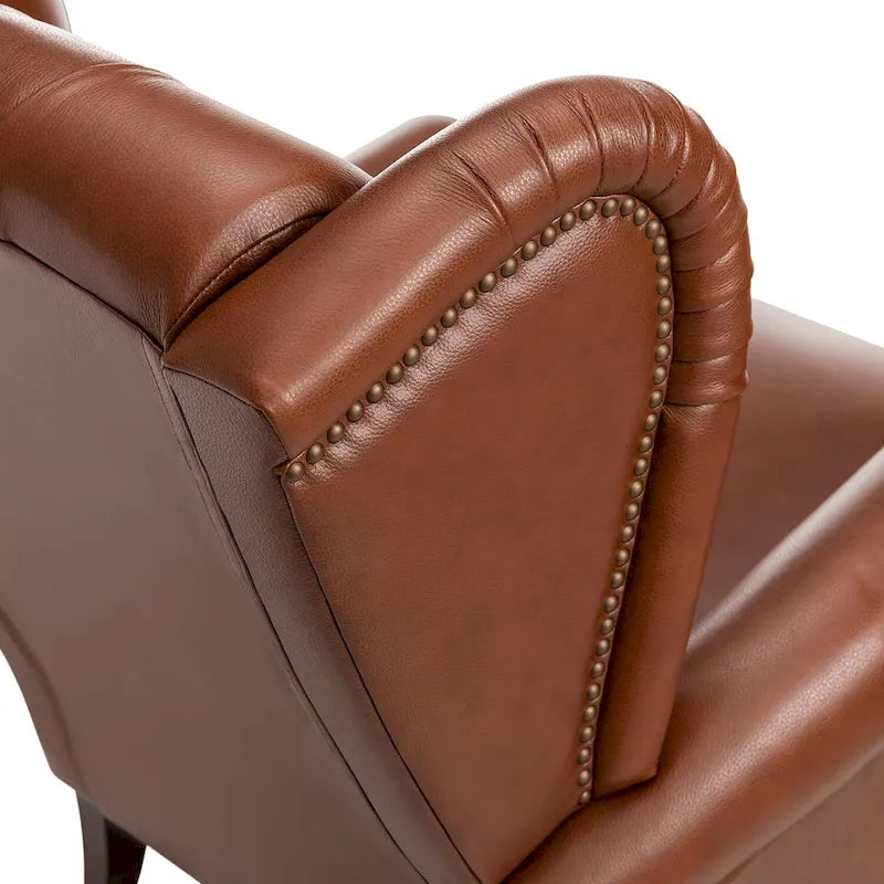 Fauteuil club en cuir clouté